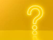 a neon question mark on a yellow background